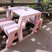 Painted pink garden bench